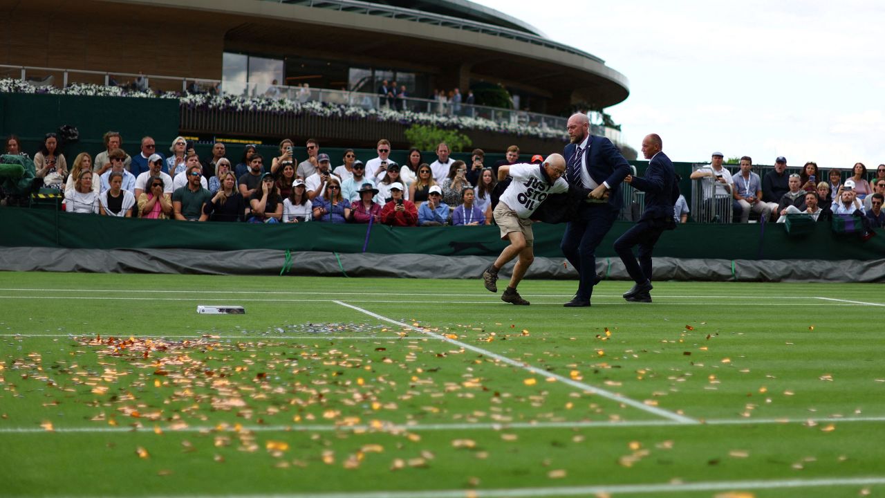 A Just Stop Oil protester disrupts a match at July's Wimbledon Championships. Sunak's ministers have been attempting to link the group to the Labour Party, which is on course to win the next election.