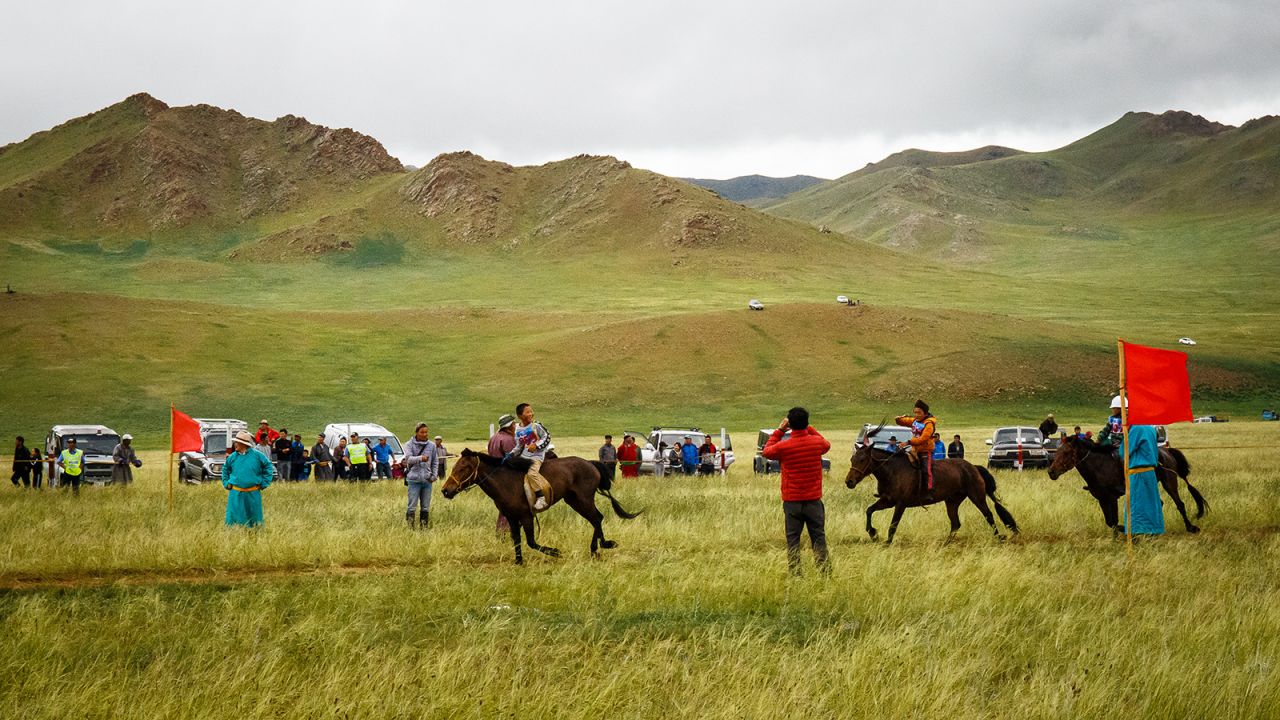 The first few jockeys make it through the finishing line. Naadam, a traditional Mongolian festival celebrating the 'three manly games' , is celebrated in Uliastai, Western Mongolia. Child jockeys up to the age of 12 can compete in the horse races, which span some 40km. It's considered an important rite of passage for Mongolian children. 09JUL16 SCMP/Tessa Chan (Photo by Tessa Chan/South China Morning Post via Getty Images)