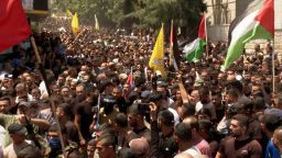 Celebratory gunfire rang out as thousands marched through the streets of Jenin and its camp to join the funeral procession that quickly turned into a demonstration of resistance.