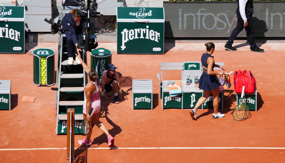 Marta Kostyuk walks straight off court following defeat to Aryna Sabalenka at the French Open.