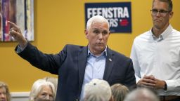 Former Vice President Mike Pence answers questions from the audience during the Woodbury County GOP and Republican Women meet and greet at Pizza Ranch with Rep. Randy Feenstra, right, in Sioux City, Iowa, Wednesday, July 5, 2023. (Jesse Brothers/Sioux City Journal via AP)