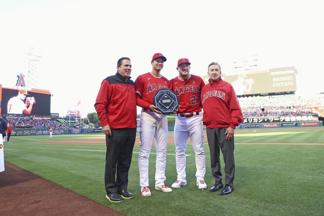 Los Angeles Angels two-way player Shohei Ohtani (2nd from L) poses for a photo with three-time MVP outfielder Mike Trout (2nd from R) during a pregame ceremony to honor his 2021 American League MVP award at Angel Stadium in Anaheim, California, on May 10, 2022. (Pool photo) (Photo by Kyodo News via Getty Images)
