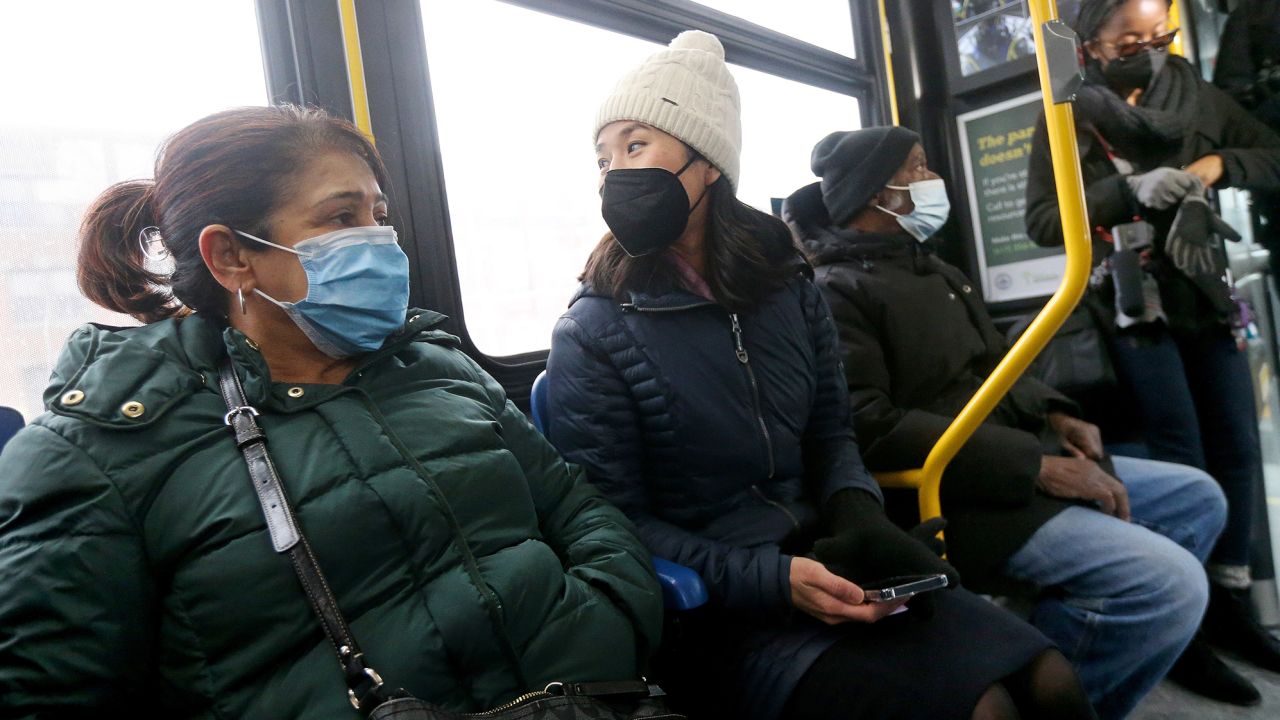 Boston Mayor Michelle Wu rides a fare-free bus in 2022. Wu has long advocated for fare-free programs.