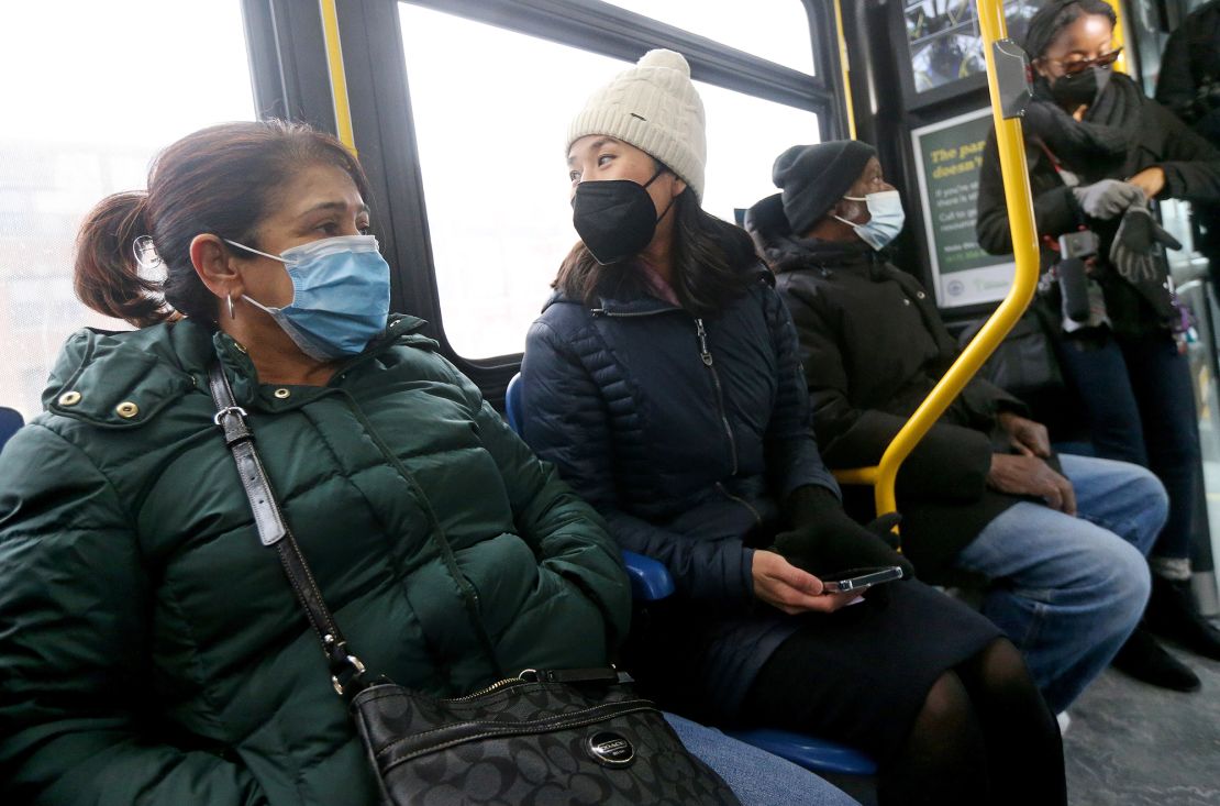 Boston Mayor Michelle Wu rides a fare-free bus in 2022. Wu has long advocated for fare-free programs.