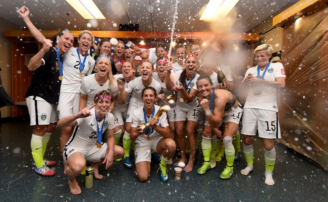 VANCOUVER, BC - JULY 05: Carli Lloyd of USA celebrates with the trophy and her team mates in the locker room after winning the FIFA Women's World Cup 2015 Final between USA and Japan at BC Place Stadium on July 5, 2015 in Vancouver, Canada. (Photo by Lars Baron - FIFA/FIFA via Getty Images)