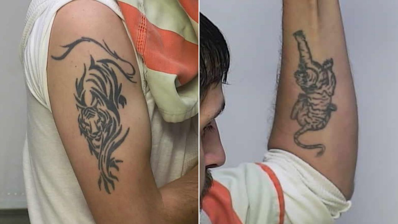 The Warren Police Department released images showing Michael Charles Burham's tattoos.