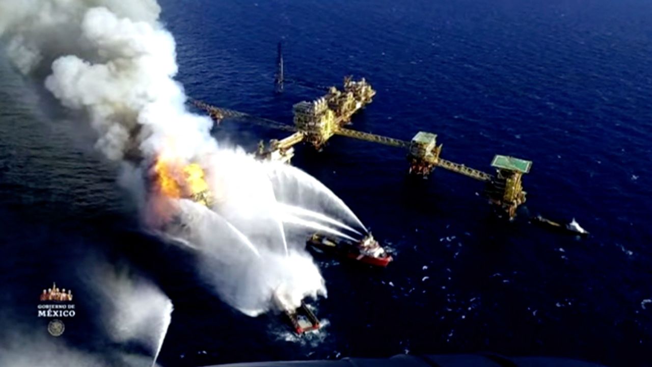Emergency crews work to put out a fire at the Nohoch Alfa oil platform.