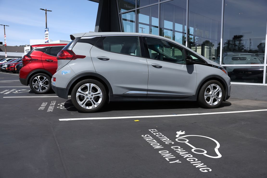 A Chevrolet Bolt EV sits parked at a charging station at Stewart Chevrolet on April 25, 2023 in Colma, California.