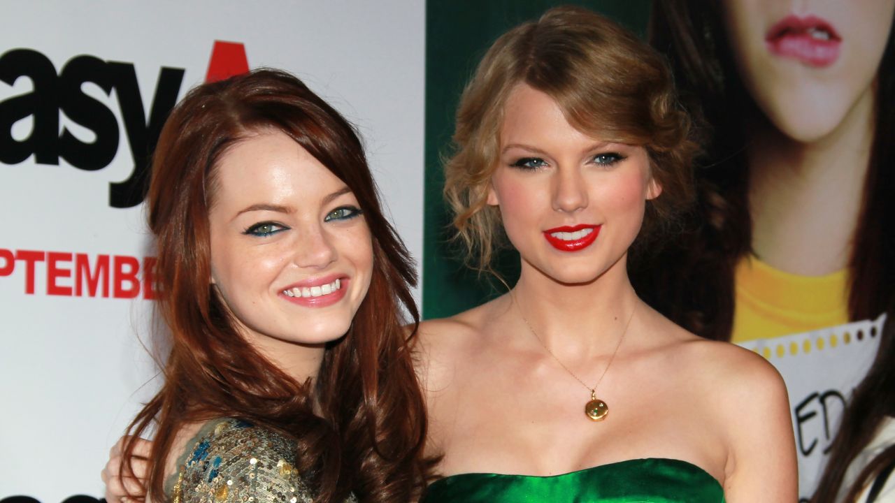 Emma Stone (left) and Taylor Swift seen at the premiere of 
