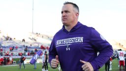 EVANSTON, ILLINOIS - OCTOBER 08: Head coach Pat Fitzgerald of the Northwestern Wildcats runs off the field after losing to the Wisconsin Badgers at Ryan Field on October 08, 2022 in Evanston, Illinois. (Photo by Michael Reaves/Getty Images)
