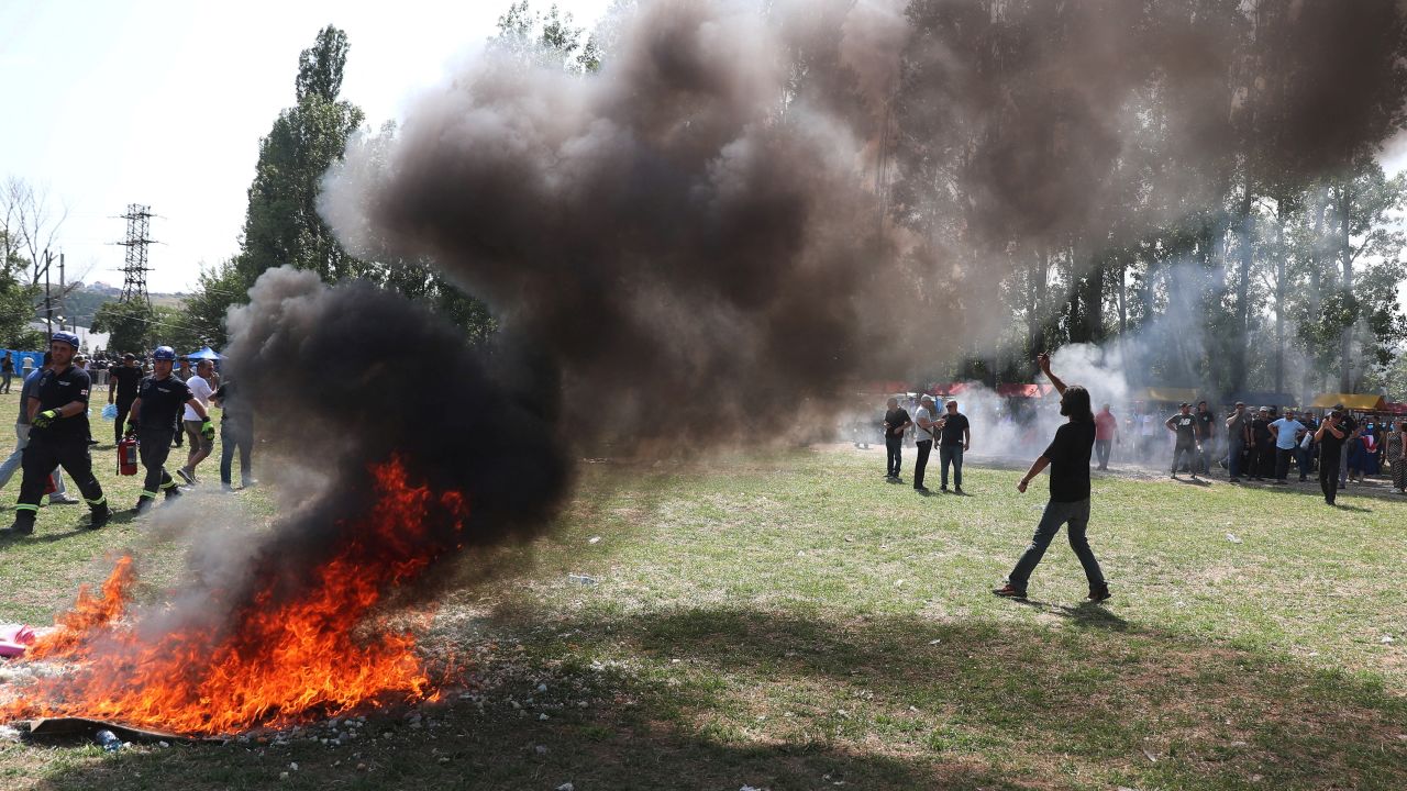 Far-right demonstrators broke through the police cordon and started a fire.