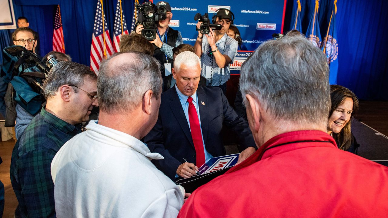 Mike Pence greets supporters and signs autographs after speaking at a campaign event in Derry, New Hampshire, on June 9, 2023.
