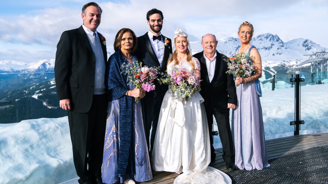 Jamie McCrazy pictured celebrating her wedding to husband, Reggie, with family. 
