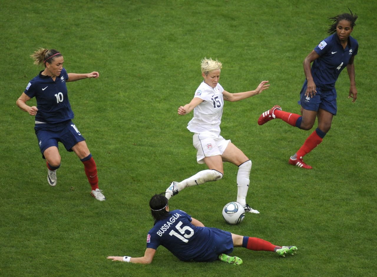 Rapinoe handles the ball during the United States' semi-final match against France at the 2011 World Cup. They would go on to defeat France before losing in the championship game to Japan.