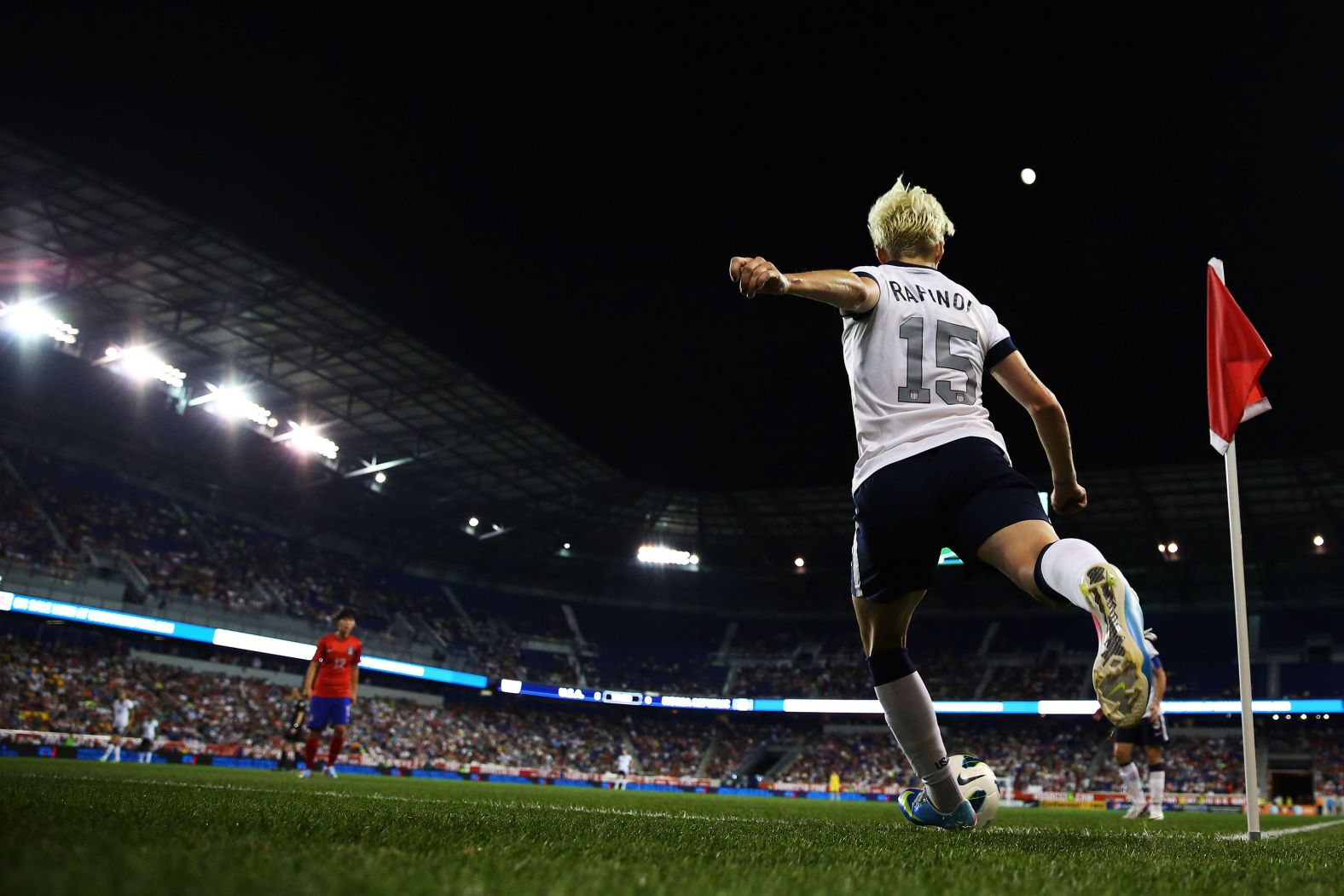 Rapinoe plays a cornerkick during a match against South Korea in Harrison, New Jersey, in 2013.