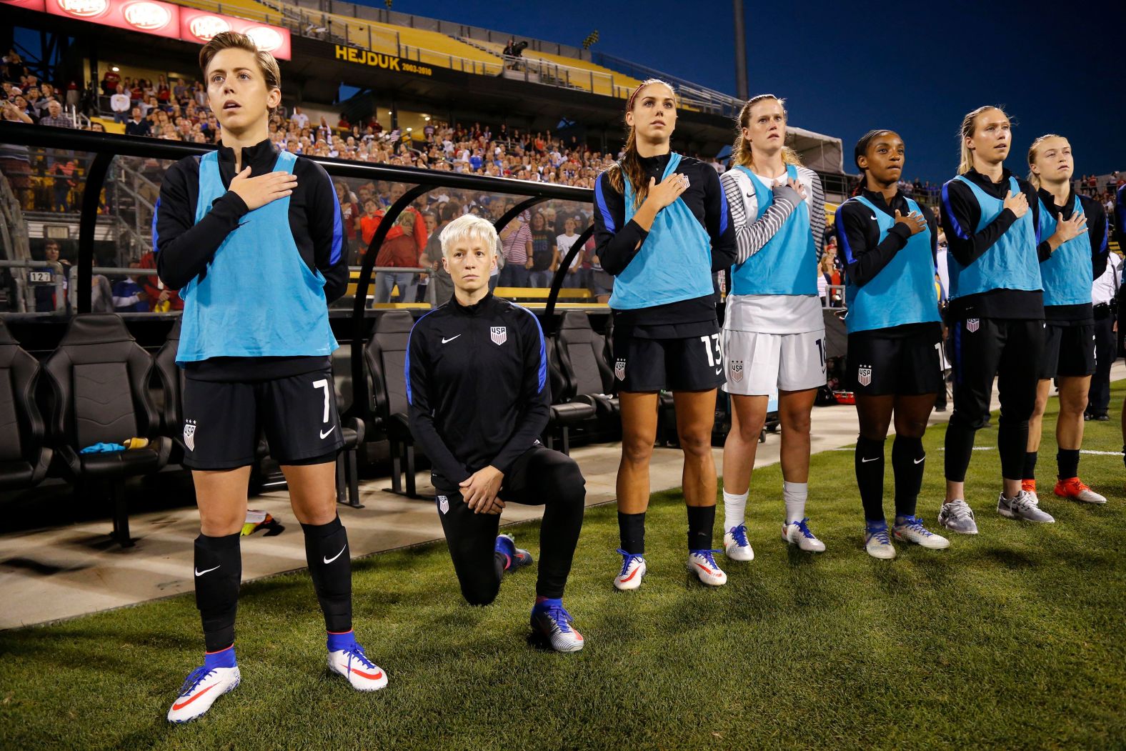 Rapinoe kneels during the National Anthem before a match against Thailand in Columbus, Ohio, in 2016. She was <a href="index.php?page=&url=https%3A%2F%2Fbleacherreport.com%2Farticles%2F2663982-megan-rapinoe-kneels-during-national-anthem-before-usa-vs-thailand" target="_blank" target="_blank">protesting racial injustice</a> in solidarity with San Francisco 49ers quarterback Colin Kaepernick.