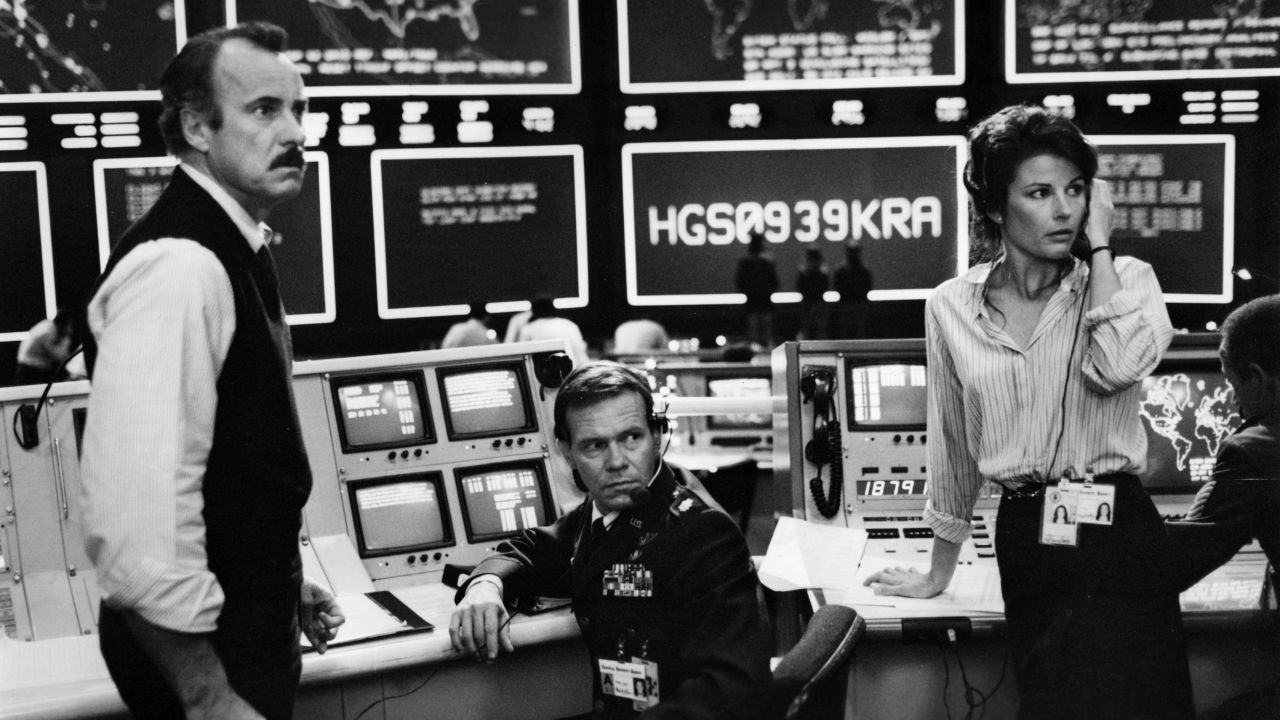 Dabney Coleman, Duncan Wilmore and Juanin Clay watch the NORAD defense computers in a scene from "WarGames."