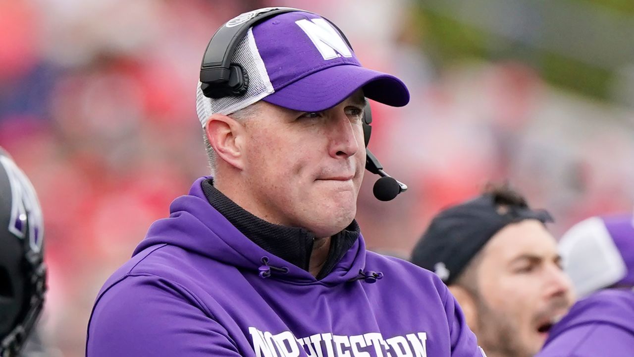 Northwestern head coach Pat Fitzgerald watches during an NCAA college football game against Ohio State in Evanston, Illinois.