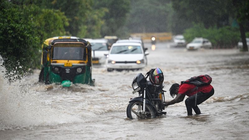 NextImg:New Delhi records wettest July day in decades as deadly floods hit northern India | CNN