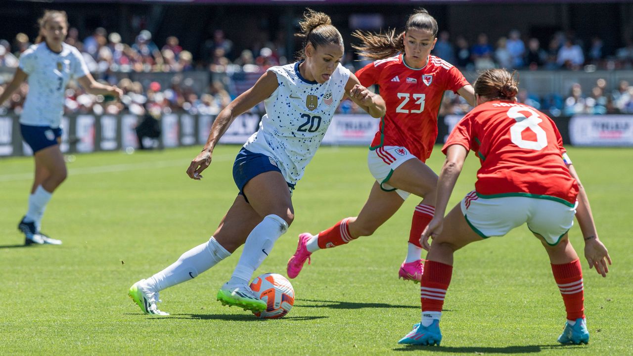 PayPal Park, San Jose, July 9th 2023: Trinity Rodman (20 United States) drives through Ffion Morgan (23 Wales) in action during a game between the United States and Wales at PayPal Park in San Jose, California.
