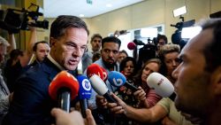 Outgoing Prime Minister Mark Rutte speaks to the press during a suspension after his statement on the fall of the cabinet at the House of Representatives in The Hague, on July 10, 2023. Dutch Prime Minister Mark Rutte said on July 10, 2023 he would quit politics after the fall of his coalition government, in a shock announcement ending the career of the Netherlands' longest-serving leader. Rutte, who has led four coalition governments since 2010, announced the fall of the four-party coalition on Friday due to a row over limits on numbers of asylum seekers. (Photo by Robin van Lonkhuijsen / ANP / AFP) / Netherlands OUT (Photo by ROBIN VAN LONKHUIJSEN/ANP/AFP via Getty Images)