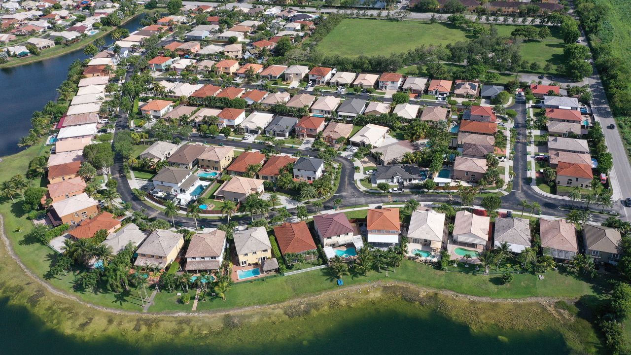 MIAMI, FLORIDA - MAY 10:  In an aerial view, single family homes are shown in a residential neighborhood on May 10, 2022 in Miami, Florida. 