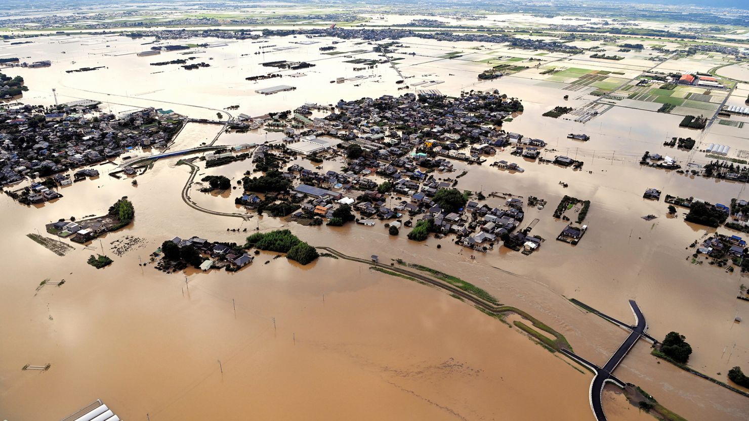 Ohashi Elementary School and the surrounding area are inundated after the Kosegawa River flooded following torrential rain on July 10, 2023 in Kurume, Fukuoka, Japan.