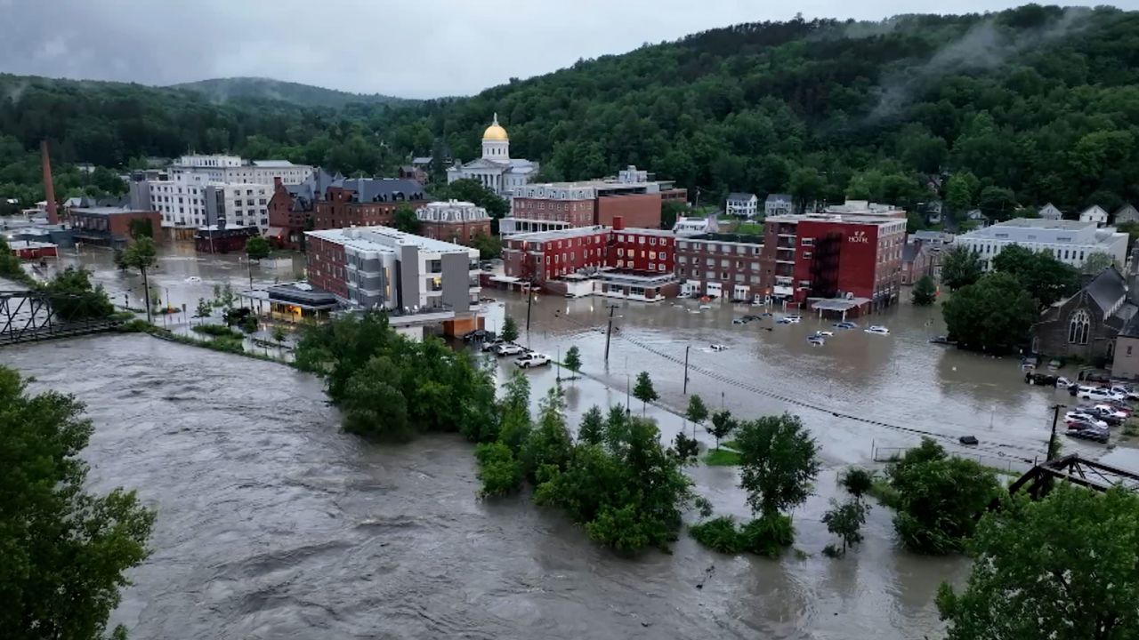 Floodwater surround buildings in downtown Montpelier, Vermont, on Tuesday.