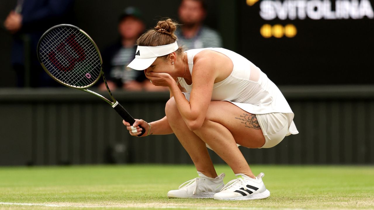 LONDON, ENGLAND - JULY 11: Elina Svitolina of Ukraine celebrates winning match point against Iga Swiatek of Poland in the Women's Singles Quarter Final match during day nine of The Championships Wimbledon 2023 at All England Lawn Tennis and Croquet Club on July 11, 2023 in London, England.