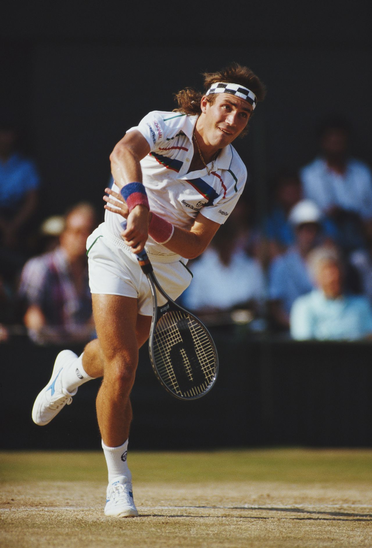 Pat Cash of Australia serves against Ivan Lendl during their Men's Singles Final match of the Wimbledon Lawn Tennis Championship on 5 July 1987 at the All England Lawn Tennis and Croquet Club in Wimbledon, London, England. (Photo by Chris Cole/Getty Images)