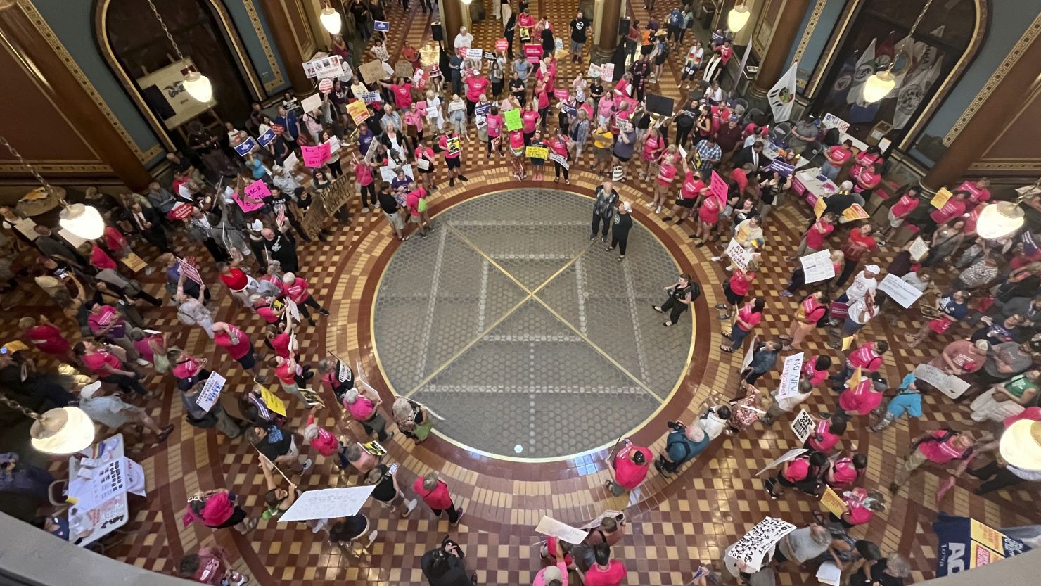 Protesters gather at the Iowa Capitol rotunda to voice opposition to the new ban on abortion after roughly six weeks of pregnancy introduced by Republican lawmakers in a special session in Des Moines, Iowa on Tuesday, July 11, 2023.