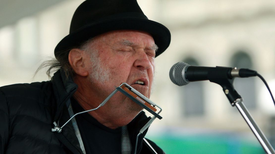 Neil Young performing at an environmental rally in British Columbia in February.