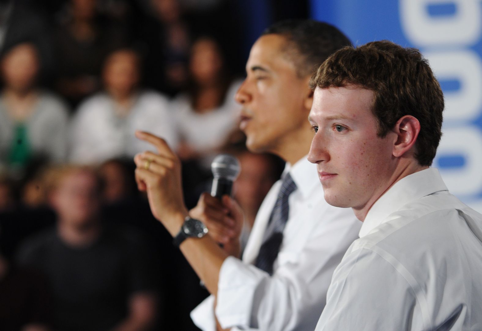 Zuckerberg joins President Barack Obama on stage as Obama speaks at a town-hall meeting at Facebook's headquarters in April 2011.