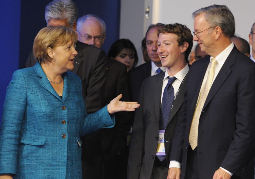 German Chancellor Angela Merkel speaks with Zuckerberg and Google CEO Eric Schmidt at the G8 Summit in May 2011.