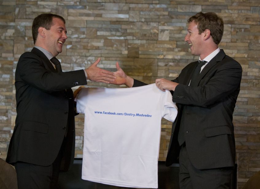 Zuckerberg presents a T-shirt to Russian Prime Minister Dmitry Medvedev during a meeting outside Moscow in October 2012.