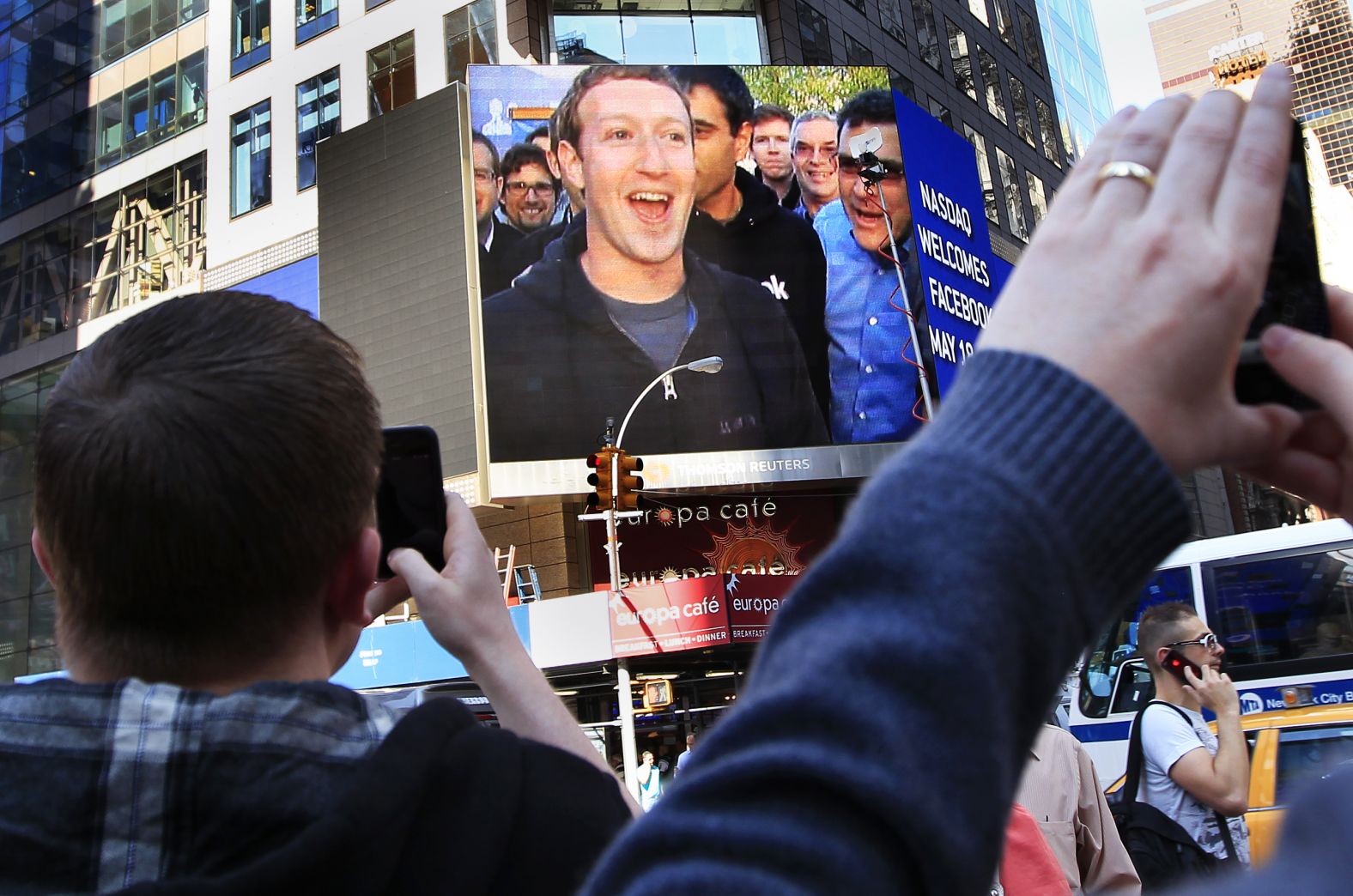 Zuckerberg is seen on a screen in New York moments after Facebook's IPO launch in May 2012.