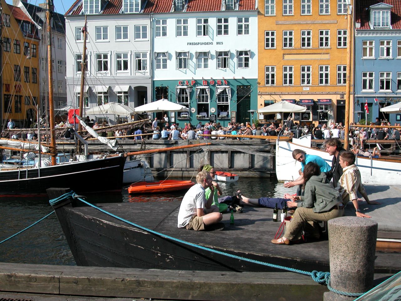 In Copenhagen, you’ll see crowds of young people along the city’s canals enjoying beer from the grocery store. Why not do the same?
