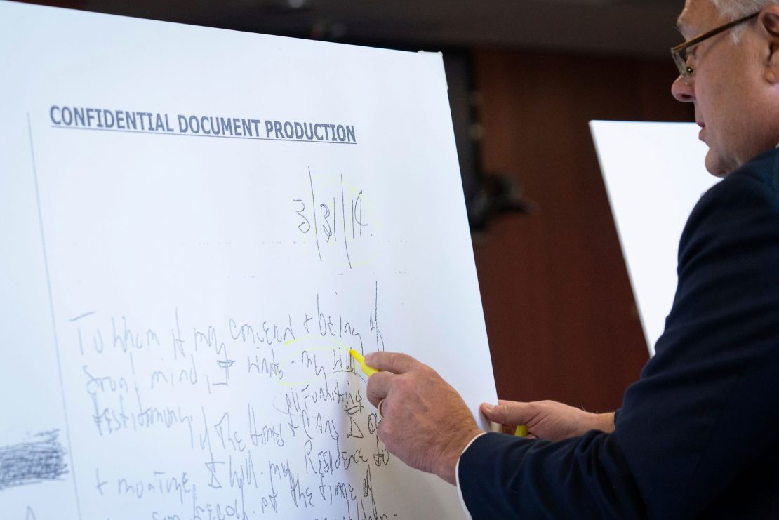 Attorney Craig Smith showing an enlarged copy of a 2014 document during closing arguments of a jury trial over Aretha Franklin's estate.  