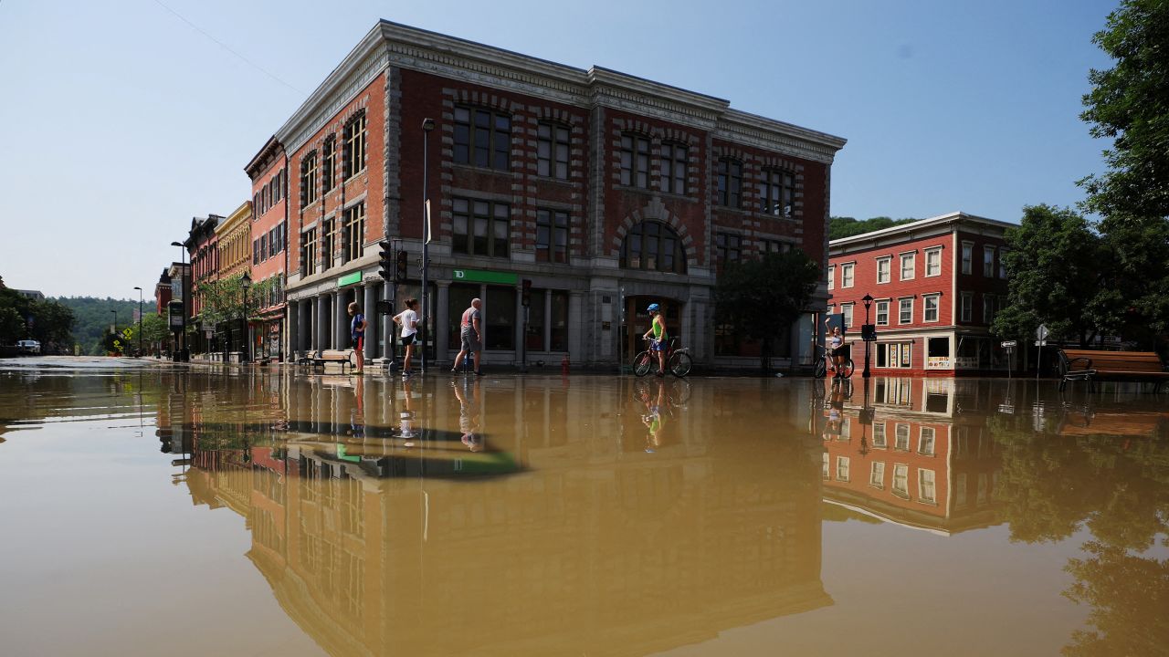 Residents look over the damage after flooding in Montpelier, Vermont, on Tuesday.