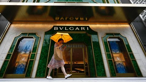 A woman walks past the entrance of a Bulgari store in Shanghai on June 29, 2023. (Photo by Pedro PARDO / AFP) (Photo by PEDRO PARDO/AFP via Getty Images)