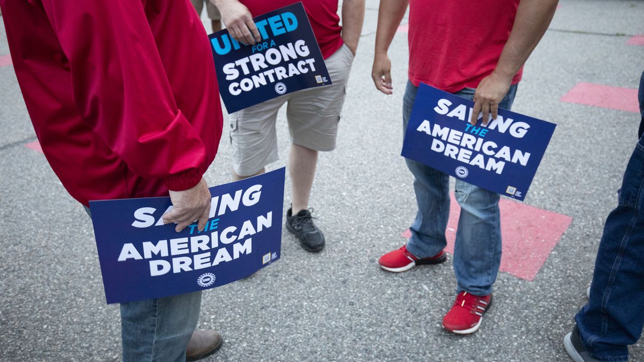 Stellantis workers attend a "members' handshake" event with United Auto Workers president Shawn Fain to mark the beginning of the UAW's contract talks with Stellantis at the Sterling Heights Assembly Plant on July 12, 2023 in Sterling Heights, Michigan. The members' handshake broke with the long-standing tradition of opening the negotiations with a ceremonial handshake between the UAW leadership and the auto company executives. The UAW opens auto contract negotiations with Stellantis today, Ford on July 14, and General Motors on July 18.