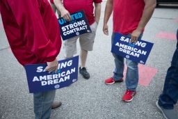 Stellantis workers attend a "members' handshake" event with United Auto Workers president Shawn Fain to mark the beginning of the UAW's contract talks with Stellantis at the Sterling Heights Assembly Plant on July 12, 2023 in Sterling Heights, Michigan. The members' handshake broke with the long-standing tradition of opening the negotiations with a ceremonial handshake between the UAW leadership and the auto company executives. The UAW opens auto contract negotiations with Stellantis today, Ford on July 14, and General Motors on July 18.