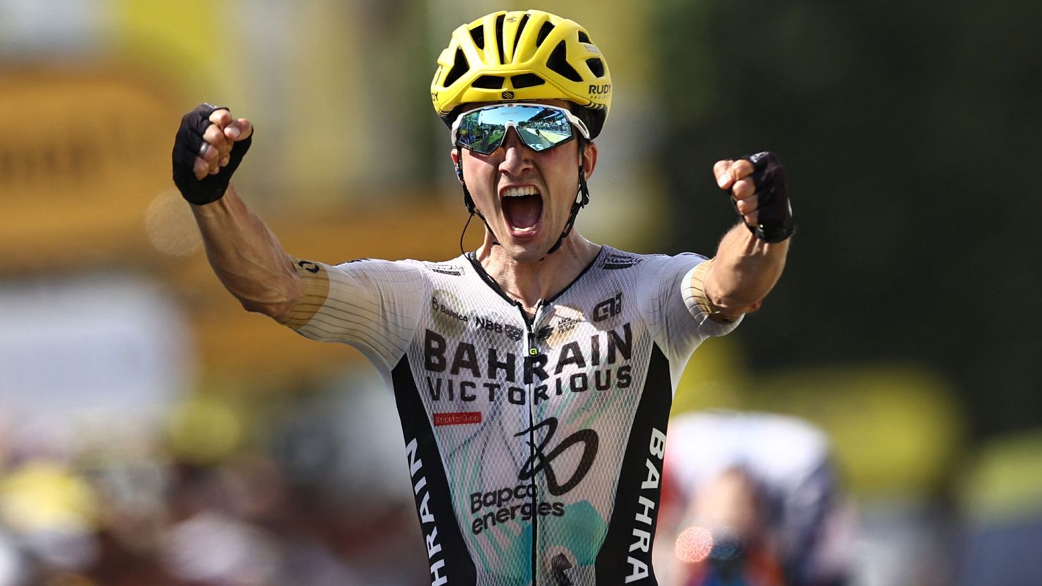 TOPSHOT - Bahrain - Victorious' Spanish rider Pello Bilbao cycles to the finish line to win the 10th stage of the 110th edition of the Tour de France cycling race, 167,5 km between Vulcania and Issoire, in the Massif Central highlands in central France, on July 11, 2023. (Photo by Anne-Christine POUJOULAT / AFP) (Photo by ANNE-CHRISTINE POUJOULAT/AFP via Getty Images)