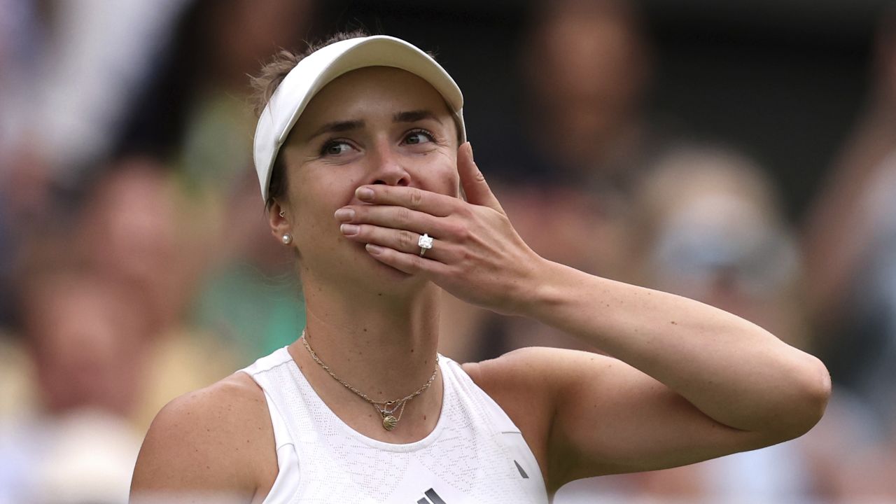 Elina Svitolina celebrates victory over Iga Swiatek following the ladies quarter finals match on day nine of the 2023 Wimbledon Championships at the All England Lawn Tennis and Croquet Club in Wimbledon. Picture date: Tuesday July 11, 2023. 72964310 (Press Association via AP Images)