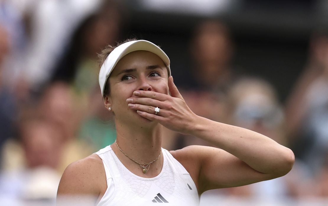Elina Svitolina celebrates victory over Iga Swiatek following the ladies quarter finals match on day nine of the 2023 Wimbledon Championships at the All England Lawn Tennis and Croquet Club in Wimbledon. Picture date: Tuesday July 11, 2023. 72964310 (Press Association via AP Images)