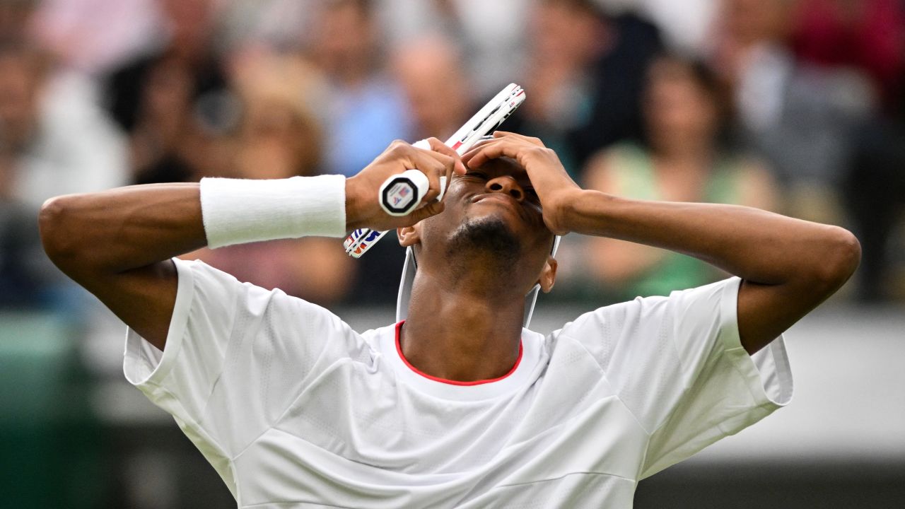 US player Christopher Eubanks reacts as he plays against Russia's Daniil Medvedev during their men's singles quarter-finals tennis match on the tenth day of the 2023 Wimbledon Championships at The All England Lawn Tennis Club in Wimbledon, southwest London, on July 12, 2023. (Photo by Glyn KIRK / AFP) / RESTRICTED TO EDITORIAL USE (Photo by GLYN KIRK/AFP via Getty Images)