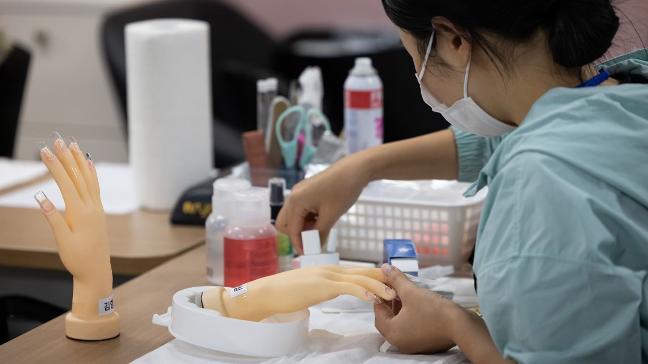 A North Korean defector at a nail art class inside Anseong Hanawon, Settlement Support Center for North Korean Refugees on Monday, July 10, 2023. 