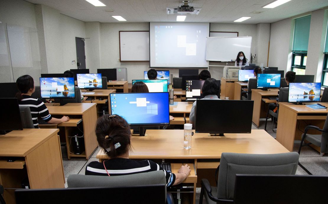 North Korean defectors attend a computer class at the Hanawon facility on July 10, 2023.