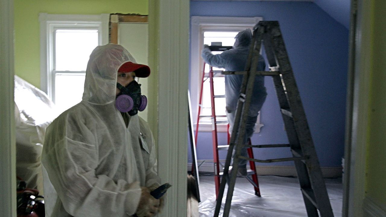 Contractors cleanable  up   pb  overgarment   astatine  a contaminated gathering  successful  Providence, Rhode Island. More than 30 cardinal  homes built earlier  1987 are estimated to person  lead-based paint, the EPA says.