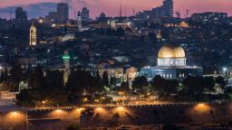The Dome of the Rock in the Old City of Jerusalem, seen from the Mount of Olives at night as the sun sets on July 27, 2019. (Photo by Kish Kim/Sipa USA)(Sipa via AP Images)